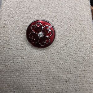 Elegant Red Button with Silver Accents (1932)